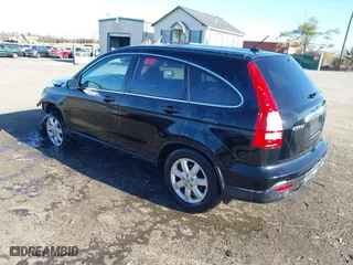 2009 Honda CR-V EX-L with VIN JHLRE48719C022962, listed as a IAAI auction lot 41819577 with 173,266 mi miles. Bid and sale history available at carsss.com. Image 3.