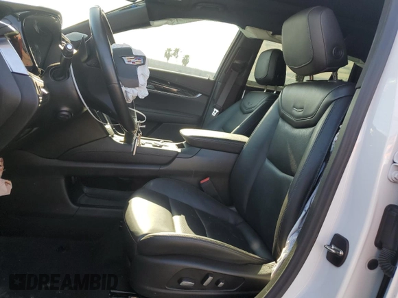 2023 Cadillac XT6 FWD Premium Luxury with VIN 1GYKPCRS5PZ120905, listed as a Copart auction lot 64374254 with 30,694 mi miles and Salvage title. Bid and sale history available at DreamBid. Image 7.