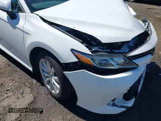2019 Toyota Camry LE with VIN 4T1B11HK2KU187475, listed as a IAAI auction lot 42192293 with 44,413 mi miles and . Bid and sale history available at DreamBid. Image 18.