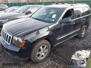2009 Jeep Grand Cherokee Laredo with VIN 1J8GR48K29C552248, listed as a IAAI auction lot 41209184 with 194,778 mi miles. Bid and sale history available at carsss.com. Image 2.