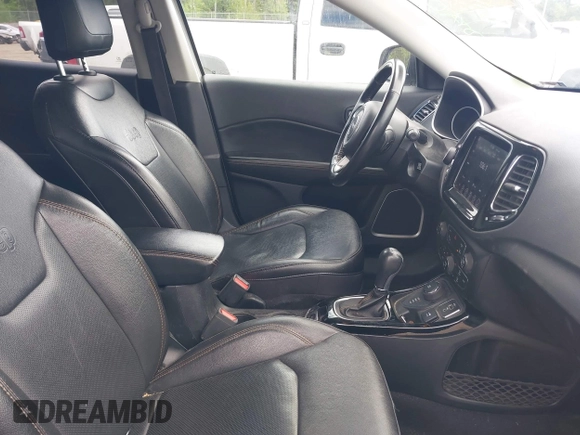 2021 Jeep Compass Limited with VIN 3C4NJDCB7MT520275, listed as a IAAI auction lot 42270862 with 130,489 mi miles and . Bid and sale history available at DreamBid. Image 5.
