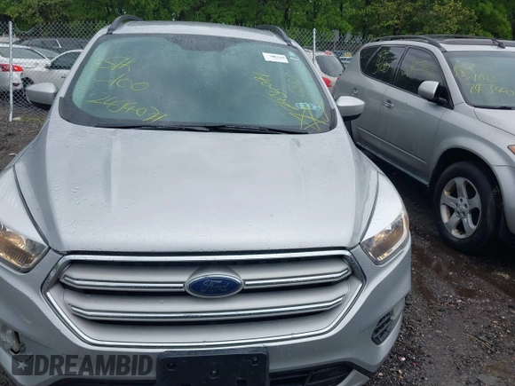 2018 Ford Escape SE with VIN 1FMCU9G99JUC41605, listed as a IAAI auction lot 39500946 with 114,032 mi miles. Bid and sale history available at carsss.com. Image 12.