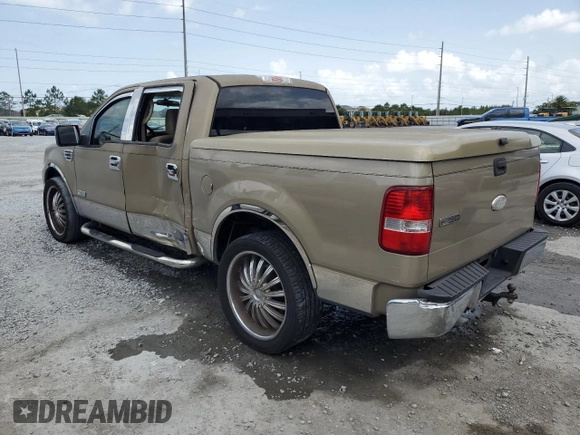 2007 Ford F-150 XLT with VIN 1FTPW12V77FA65348, listed as a Copart auction lot 59727355 with 146,566 mi miles and Salvage title. Bid and sale history available at DreamBid. Image 2.