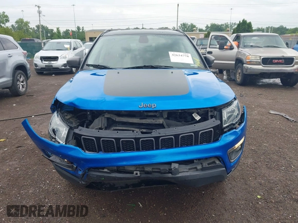 2019 Jeep Compass Trailhawk z VIN 3C4NJDDB6KT760638, wystawiony jako IAAI lot #42634778 z przebiegiem 88 965 mil mil oraz . Historia ofert i sprzedaży dostępna na DreamBid. Obrazek 12.