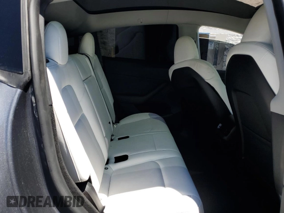 2024 Tesla Model Y Long Range with VIN 7SAYGDEEXRA215975, listed as a Copart auction lot 56705585 with 20,554 mi miles and Salvage Title. Bid and sale history available at DreamBid. Image 10.
