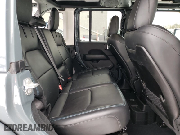 2024 Jeep Wrangler Rubicon with VIN 1C4RJXR66RW237347, listed as a Copart auction lot 88774995 with 18,018 mi miles and Salvage Title. Bid and sale history available at DreamBid. Image 11.