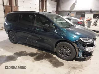 2023 Chrysler Pacifica Hybrid Limited with VIN 2C4RC1S74PR554723, listed as a IAAI auction lot 41317141 with 16,960 mi miles and . Bid and sale history available at DreamBid. Image 1.