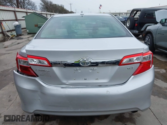 2014 Toyota Camry SE with VIN 4T1BK1FK7EU540975, listed as a IAAI auction lot 41673926 with 190,036 mi miles. Bid and sale history available at carsss.com. Image 6.