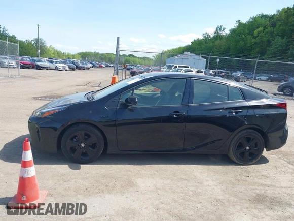 2022 Toyota Prius L Eco with VIN JTDKAMFU0N3175619, listed as a IAAI auction lot 42098135 with 72,984 mi miles and . Bid and sale history available at DreamBid. Image 14.