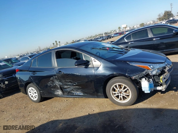 2021 Toyota Prius L Eco with VIN JTDKAMFU1M3134107, listed as a IAAI auction lot 41763080 with 185,248 mi miles. Bid and sale history available at carsss.com. Image 14.