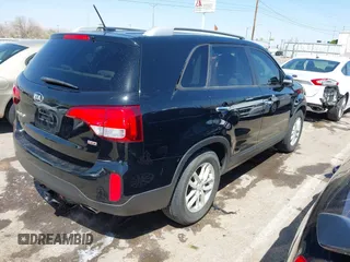 2015 Kia Sorento LX with VIN 5XYKT4A79FG586350, listed as a IAAI auction lot 42024191 with 144,550 mi miles. Bid and sale history available at carsss.com. Image 4.