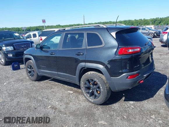 2016 Jeep Cherokee Trailhawk z VIN 1C4PJMBS6GW162742, wystawiony jako IAAI lot #42383200 z przebiegiem 124 791 mil mil oraz . Historia ofert i sprzedaży dostępna na DreamBid. Obrazek 14.