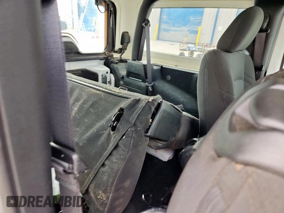 2023 Jeep Wrangler Sport with VIN 1C4HJXAG4PW667732, listed as a Copart auction lot 61261215 with 48,089 mi miles and Salvage title. Bid and sale history available at DreamBid. Image 10.