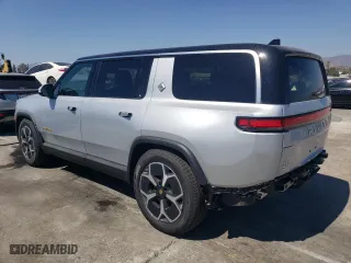 2024 Rivian R1S Adventure with VIN 7PDSGABA7RN036602, listed as a Copart auction lot 67867944 with 1,006 mi miles and Salvage Title. Bid and sale history available at carsss.com. Image 2.