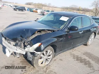 2013 Infiniti M with VIN JN1BY1AR3DM600436, listed as a IAAI auction lot 42031696 with 114,637 mi miles and . Bid and sale history available at DreamBid. Image 2.