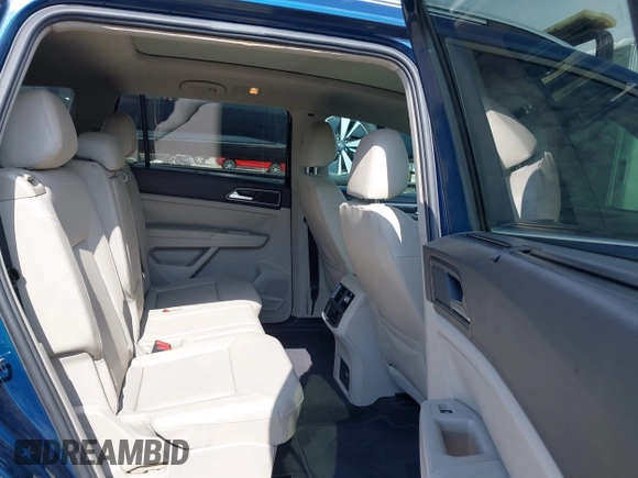 2018 Volkswagen Atlas SEL z VIN 1V2MR2CA4JC512804, wystawiony jako IAAI lot #42528402 z przebiegiem 59 226 mil mil oraz . Historia ofert i sprzedaży dostępna na DreamBid. Obrazek 8.