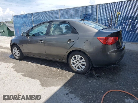2010 Kia Forte EX z VIN KNAFU4A20A5295544, wystawiony jako Copart lot #58595625 z przebiegiem 322 520 mil mil oraz Szkoda całkowita • Salvage title. Historia ofert i sprzedaży dostępna na DreamBid. Obrazek 2.