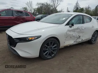 2021 Mazda 3 Select with VIN JM1BPBKL5M1339375, listed as a IAAI auction lot 42547155 with 43,793 mi miles and . Bid and sale history available at DreamBid. Image 2.
