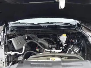 2021 Ram 1500 Tradesman z VIN 3C6RR6KT2MG704541, wystawiony jako IAAI lot #42234019 z przebiegiem 19 227 mil mil oraz . Historia ofert i sprzedaży dostępna na DreamBid. Obrazek 10.