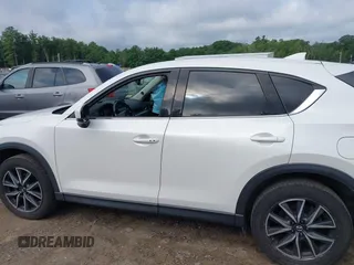 2018 Mazda CX-5 Grand Touring with VIN JM3KFBDM0J0308813, listed as a IAAI auction lot 42657978 with 78,119 mi miles and . Bid and sale history available at DreamBid. Image 15.