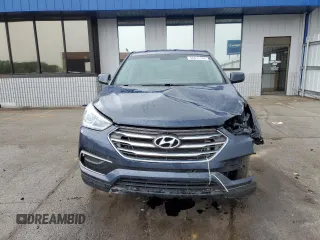 2018 Hyundai Santa Fe 2.4L z VIN 5NMZTDLB7JH077713, wystawiony jako Copart lot #56671245 z przebiegiem 90 442 mil mil oraz Szkoda całkowita • Salvage title. Historia ofert i sprzedaży dostępna na DreamBid. Obrazek 5.