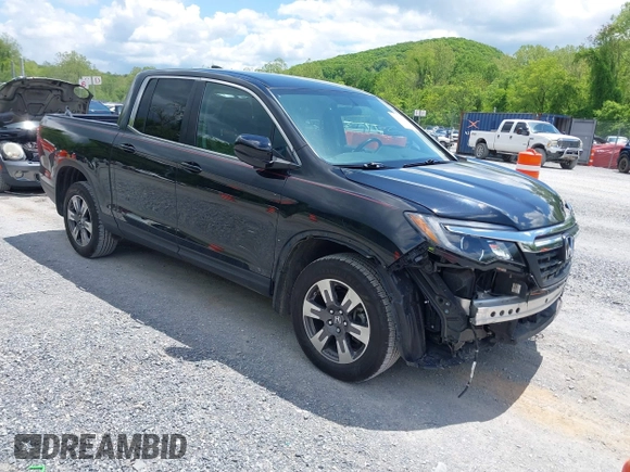 2017 Honda Ridgeline RTL with VIN 5FPYK3F51HB013989, listed as a IAAI auction lot 42206513 with 146,124 mi miles and . Bid and sale history available at DreamBid. Image 1.