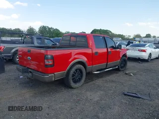 2005 Ford F-150 XLT with VIN 1FTPW12585KE04249, listed as a IAAI auction lot 41983950 with 212,289 mi miles. Bid and sale history available at carsss.com. Image 4.