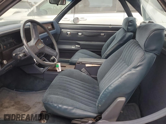 1984 Chevrolet El Camino z VIN 1GCCW80H7ER173291, wystawiony jako Copart lot #76606244 z przebiegiem Nie podano mil oraz Szkoda całkowita • Salvage title. Historia ofert i sprzedaży dostępna na DreamBid. Obrazek 7.