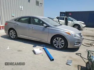 2012 Hyundai Azera with VIN KMHFG4JG8CA125699, listed as a Copart auction lot 66603405 with 129,673 mi miles and Clean title. Bid and sale history available at DreamBid. Image 4.
