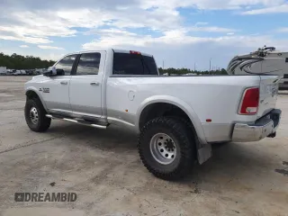2015 Ram 3500 Laramie with VIN 3C63RRJL2FG661749, listed as a Copart auction lot 71062544 with 126,775 mi miles and Salvage Title. Bid and sale history available at carsss.com. Image 2.