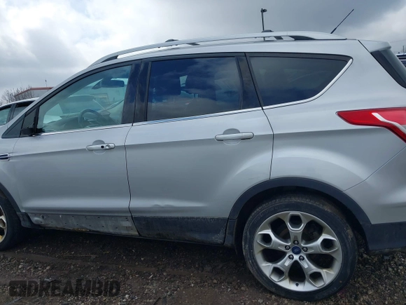 2013 Ford Escape Titanium with VIN 1FMCU9J90DUC22888, listed as a IAAI auction lot 41664550 with 185,568 mi miles and . Bid and sale history available at DreamBid. Image 14.