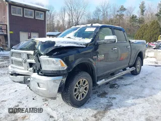 2018 Ram 2500 Laramie with VIN 3C6UR5FJXJG253495, listed as a IAAI auction lot 41084906 with 82,614 mi miles. Bid and sale history available at carsss.com. Image 2.