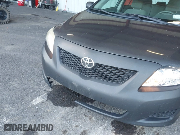 2010 Toyota Corolla with VIN 2T1BU4EE2AC223494, listed as a IAAI auction lot 40296069 with 141,817 mi miles. Bid and sale history available at carsss.com. Image 12.