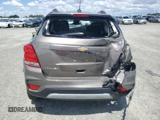 2021 Chevrolet Trax LT z VIN KL7CJPSB3MB331759, wystawiony jako Copart lot #56498305 z przebiegiem 79 340 mil mil oraz Nie do naprawy • Non repairable. Historia ofert i sprzedaży dostępna na DreamBid. Obrazek 6.