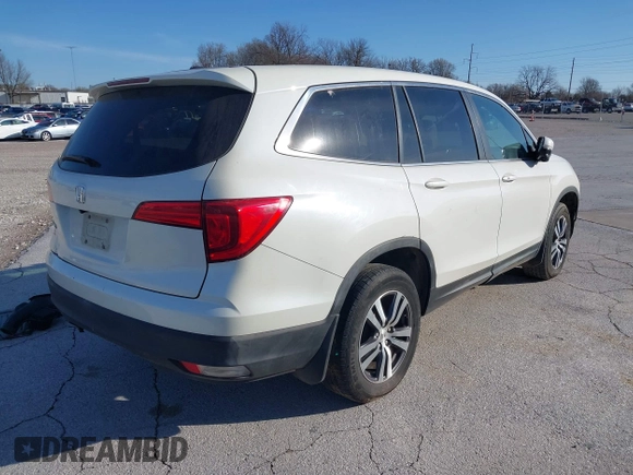 2016 Honda Pilot EX-L with VIN 5FNYF5H5XGB016152, listed as a IAAI auction lot 41820023 with 210,474 mi miles and . Bid and sale history available at DreamBid. Image 4.