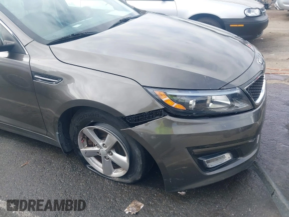 2015 Kia Optima LX with VIN 5XXGM4A72FG400848, listed as a IAAI auction lot 40802198 with 173,270 mi miles and . Bid and sale history available at DreamBid. Image 18.