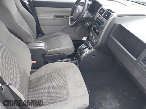 2007 Jeep Compass Sport with VIN 1J8FT47W27D256252, listed as a IAAI auction lot 41616554 with 210,125 mi miles. Bid and sale history available at carsss.com. Image 5.