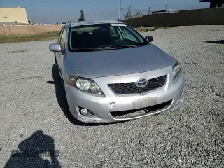 2010 Toyota Corolla z VIN 1NXBU4EE2AZ380585, wystawiony jako Copart lot #57024125 z przebiegiem 175 334 mil mil oraz Szkoda całkowita • Salvage title. Historia ofert i sprzedaży dostępna na DreamBid. Obrazek 13.