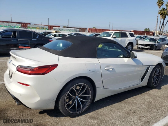 2022 BMW Z4 sDrive30i with VIN WBAHF3C02NWX82592, listed as a Copart auction lot 54182084 with 26,809 mi miles. Bid and sale history available at carsss.com. Image 3.