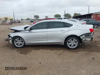 2014 Chevrolet Impala LT with VIN 2G1125S38E9102607, listed as a IAAI auction lot 41860235 with 128,599 mi miles and . Bid and sale history available at DreamBid. Image 15.