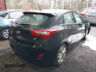 2014 Hyundai Elantra GT with VIN KMHD35LH5EU171863, listed as a IAAI auction lot 41299174 with 89,090 mi miles. Bid and sale history available at carsss.com. Image 4.