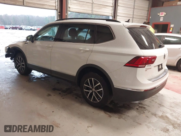 2020 Volkswagen Tiguan SE with VIN 3VV3B7AX4LM141023, listed as a IAAI auction lot 41521923 with 69,479 mi miles and . Bid and sale history available at DreamBid. Image 3.