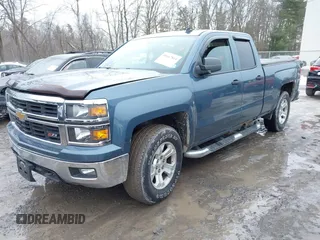 2014 Chevrolet Silverado 1500 LT with VIN 1GCVKREC3EZ192671, listed as a IAAI auction lot 41667814 with 124,292 mi miles and . Bid and sale history available at DreamBid. Image 2.