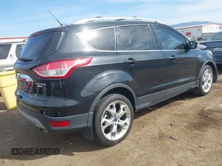 2014 Ford Escape Titanium with VIN 1FMCU9J93EUE27803, listed as a IAAI auction lot 42028249 with 131,194 mi miles and . Bid and sale history available at DreamBid. Image 4.
