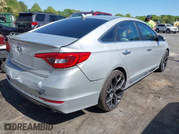 2015 Hyundai Sonata Sport with VIN 5NPE34AF6FH256579, listed as a IAAI auction lot 42052813 with 103,988 mi miles and . Bid and sale history available at DreamBid. Image 4.