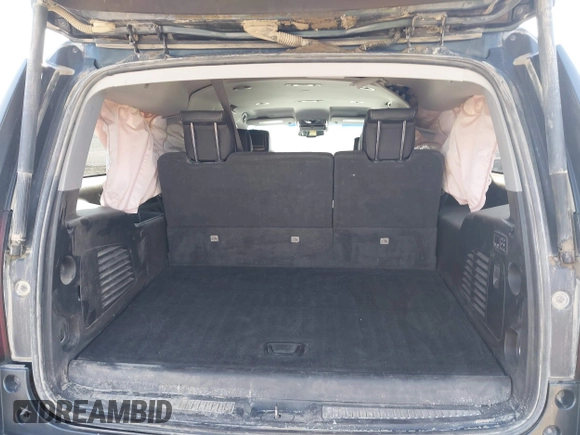 2019 Chevrolet Suburban Premier with VIN 1GNSKJKJ8KR169252, listed as a IAAI auction lot 41472231 with 95,266 mi miles and . Bid and sale history available at DreamBid. Image 16.