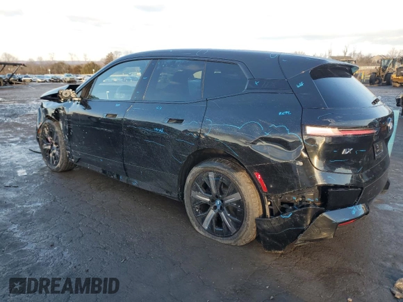 2025 BMW iX xDrive50 with VIN WB523CF0XSCT63136, listed as a Copart auction lot 44538265 with 230 mi miles and Salvage Title. Bid and sale history available at carsss.com. Image 2.
