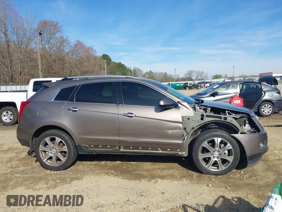 2012 Cadillac SRX Performance Collection with VIN 3GYFNBE3XCS565616, listed as a IAAI auction lot 41835476 with 141,259 mi miles. Bid and sale history available at carsss.com. Image 14.