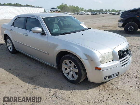 2006 Chrysler 300 Touring with VIN 2C3KA53G26H459048, listed as a IAAI auction lot 42049103 with 256,564 mi miles. Bid and sale history available at carsss.com. Image 1.