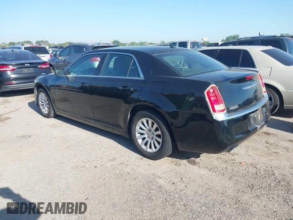 2013 Chrysler 300 with VIN 2C3CCAAGXDH743261, listed as a IAAI auction lot 41982698 with 148,107 mi miles. Bid and sale history available at carsss.com. Image 3.